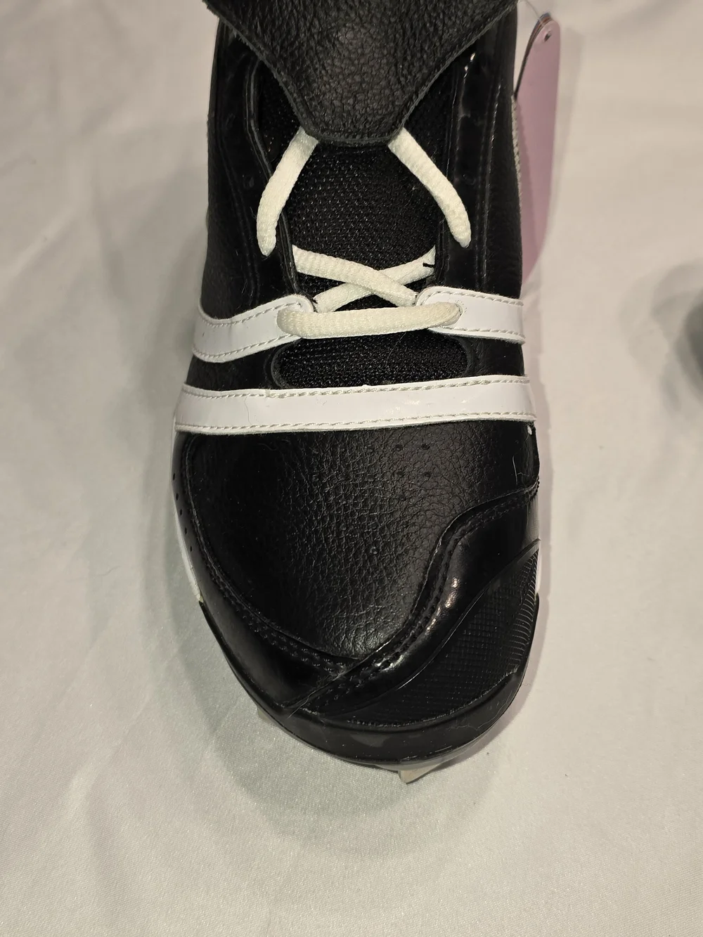 Nike Black and White Baseball Cleats with Colored Heel Tabs